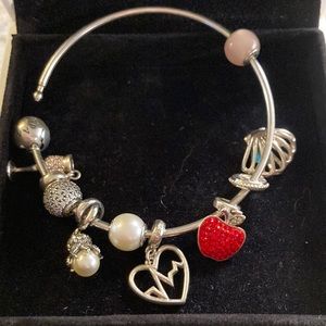 Pandora bangle bracelet with multiple charms